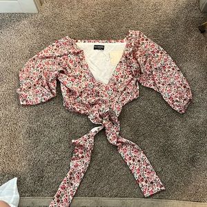 Kittenish crop tie silk top